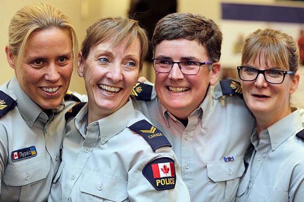 Photo of Kerry Williams and three other female police officers laughing